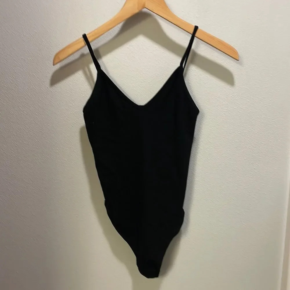 Bp woman’s black thong bodysuit